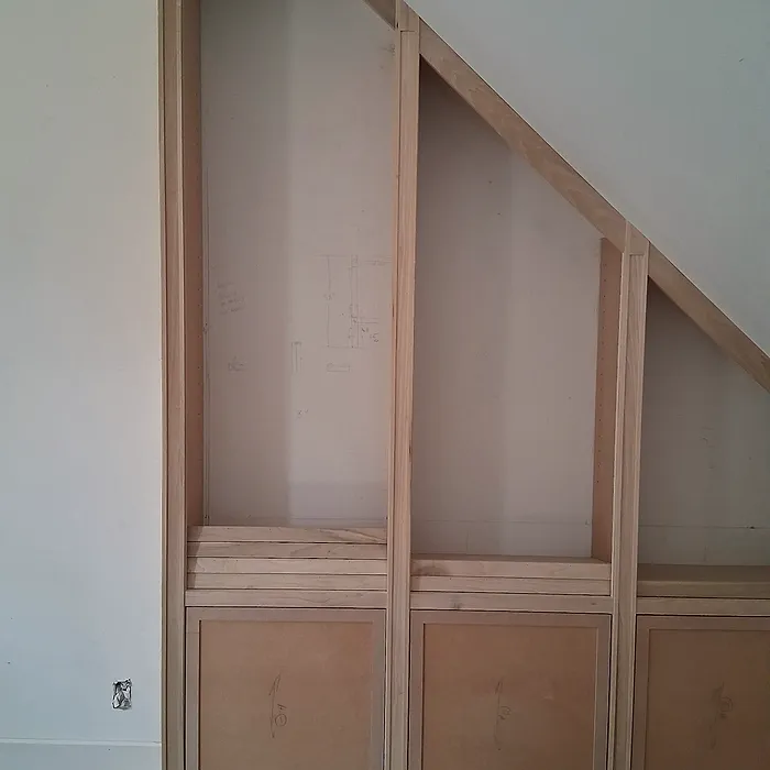 Under-stair built-in cabinetry and shelving