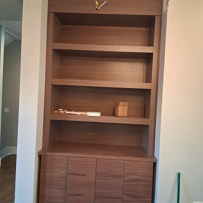 Built-in bookcase with a cabinet base and drawers