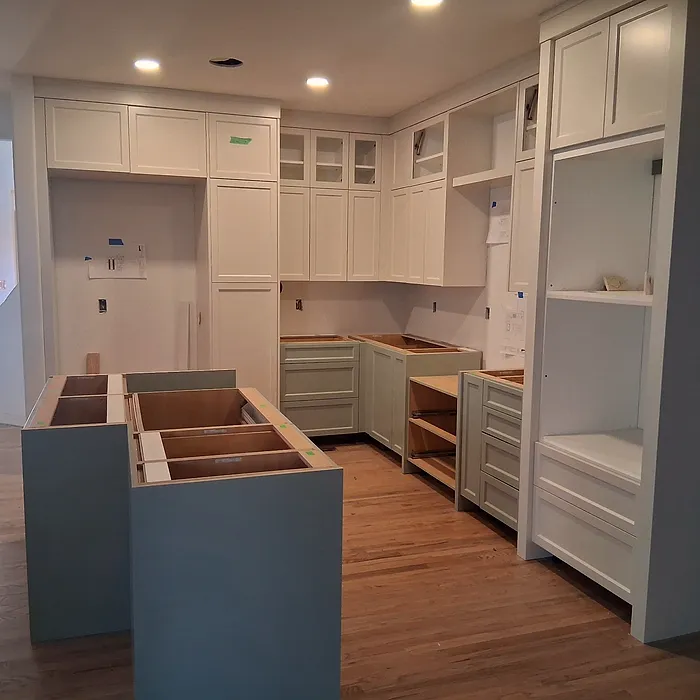 Custom kitchen and pantry cabinetry with islands